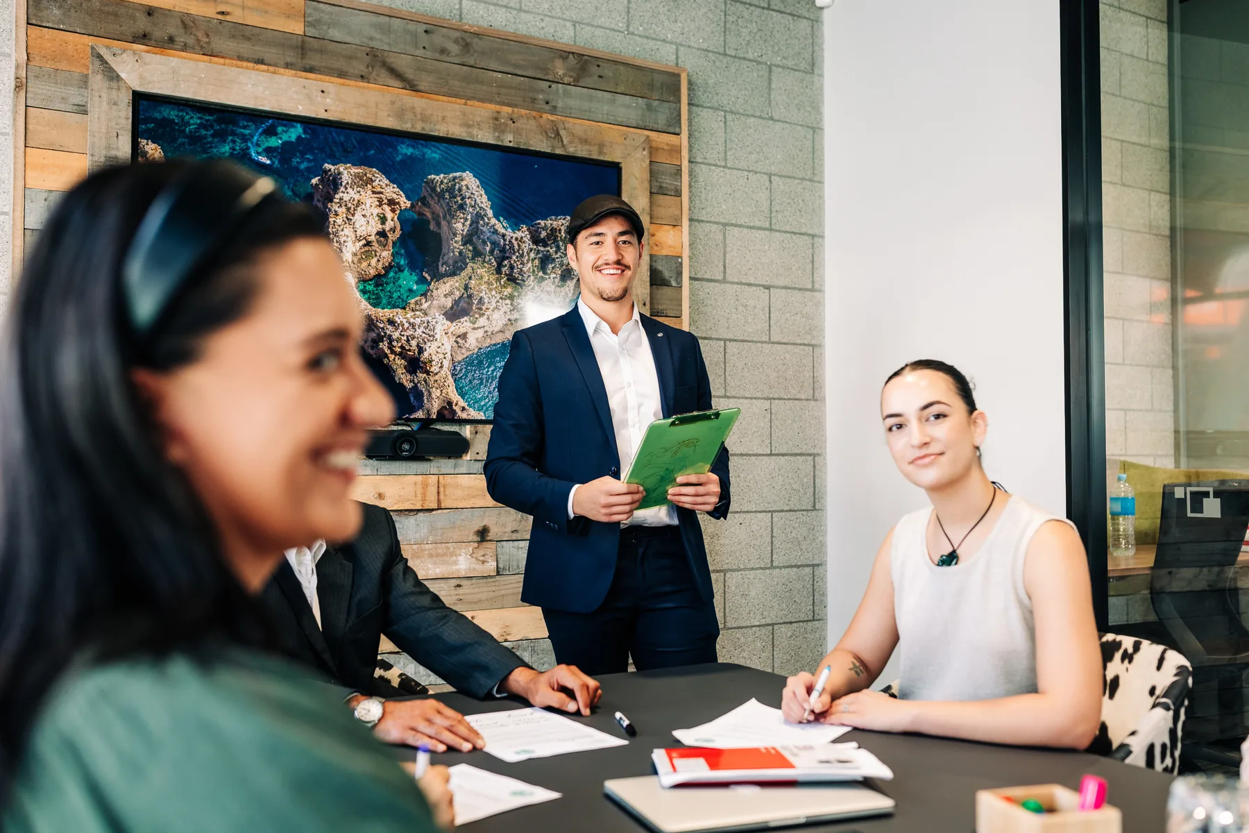 People meeting around a table in a community setting